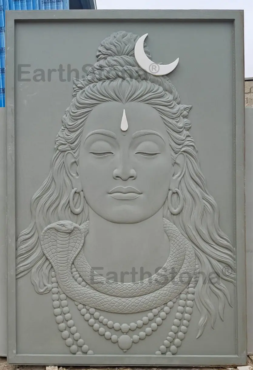 Elegant natural stone Shiva face wall mural with Italian marble frame, backlighting and decorative console by EarthStona